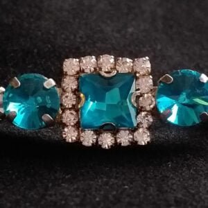 Blue rhinestone stock pin brooch