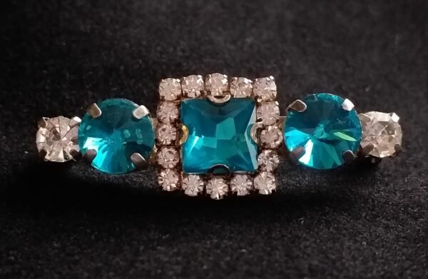 Blue rhinestone stock pin brooch
