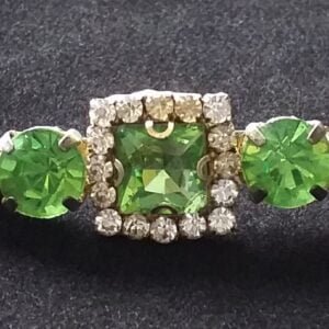 green rhinestone stock pin brooch